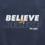 Ted Lasso Believe in Believe Fleece Crewneck Sweatshirt logo